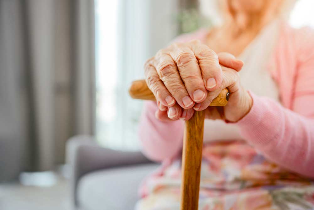 Elderly lady receiving domiciliary care at home